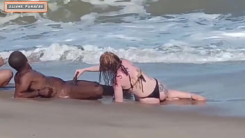 Aroused couple takes a random guy on the beach for a threesome